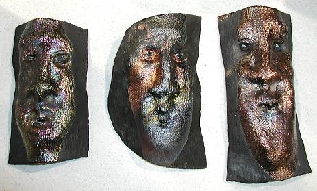 A grouping of three masks.